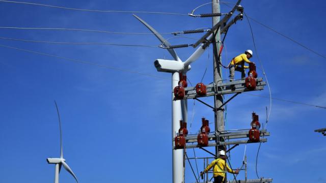 Technicians at a wind and solar Farm in the Philippines. Photo credit: Asian Development Bank.