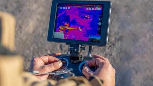 Firefighter flying drone with thermal camera. Photo credit: iStock/Cristian Martin